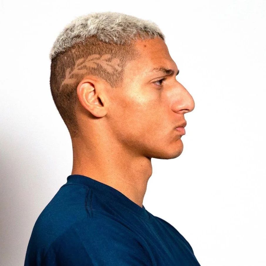 The Tottenham Hotspur forward currently has an army cut with a blonde color in his hair.