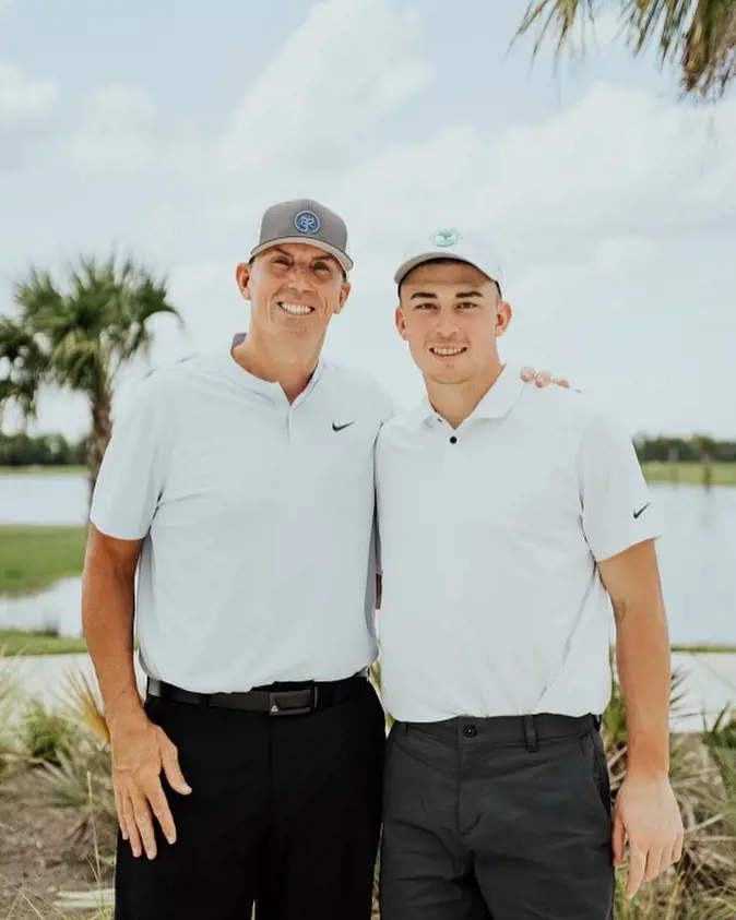 Terry loves playing golf with his son