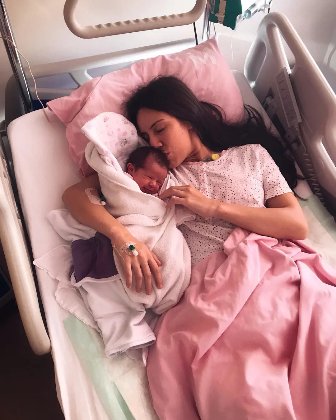 Kristina kissing her newly born daughter Nadja on December 27, 2018 