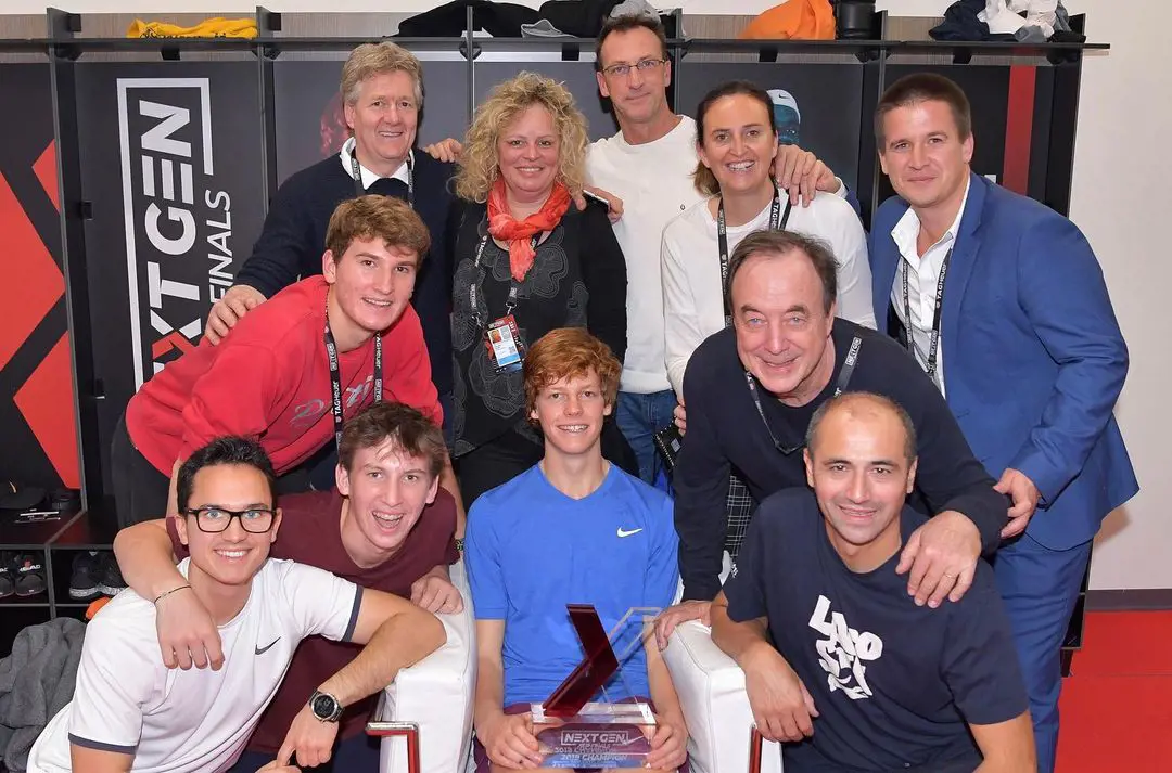 Seinner with his parents, brother, and coaches at NextGenFinals in Milan