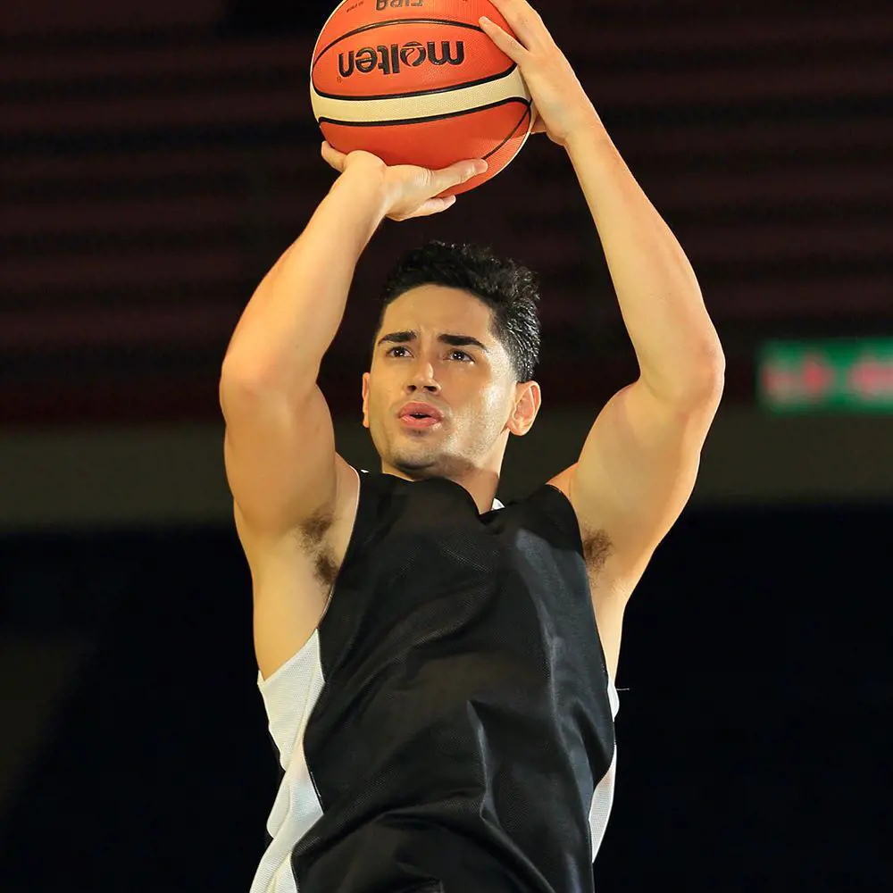 Chris Playing basketball for Meralco Bolts.