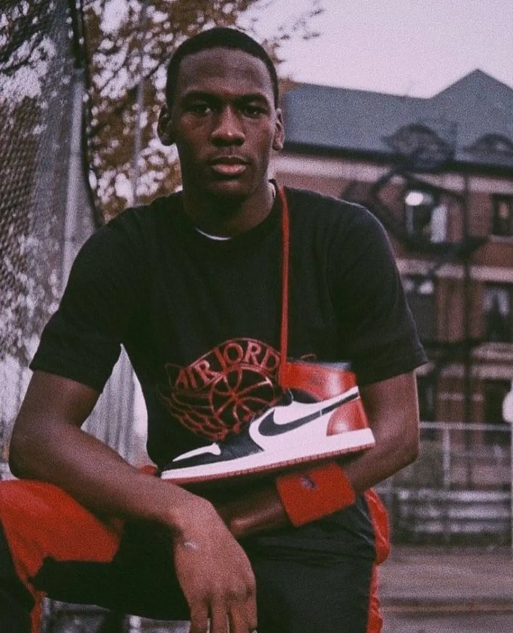 Michael Jordan's youth photo with his Air Jordan sneakers