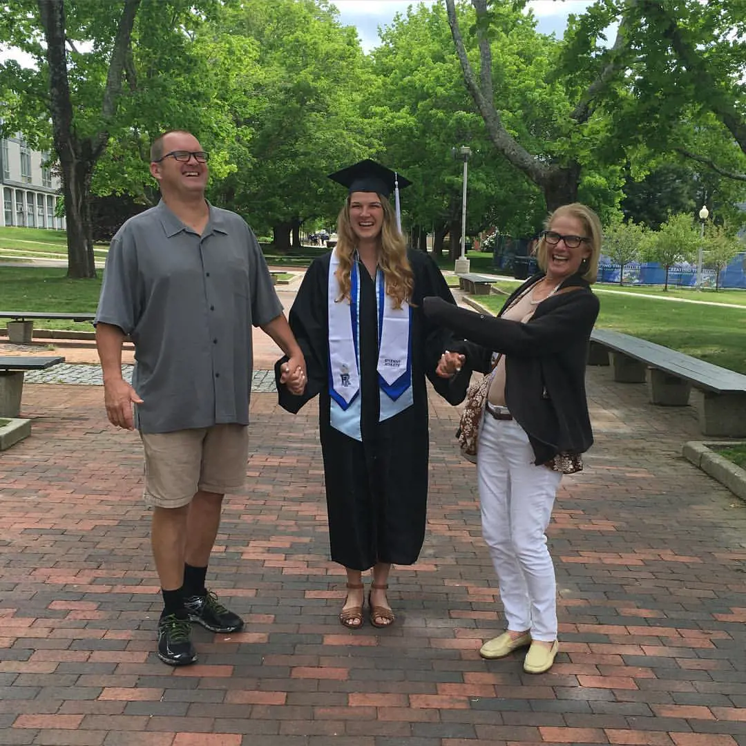 Sam older sister Franki on her graduation day in May 2016 with Chris and Mike