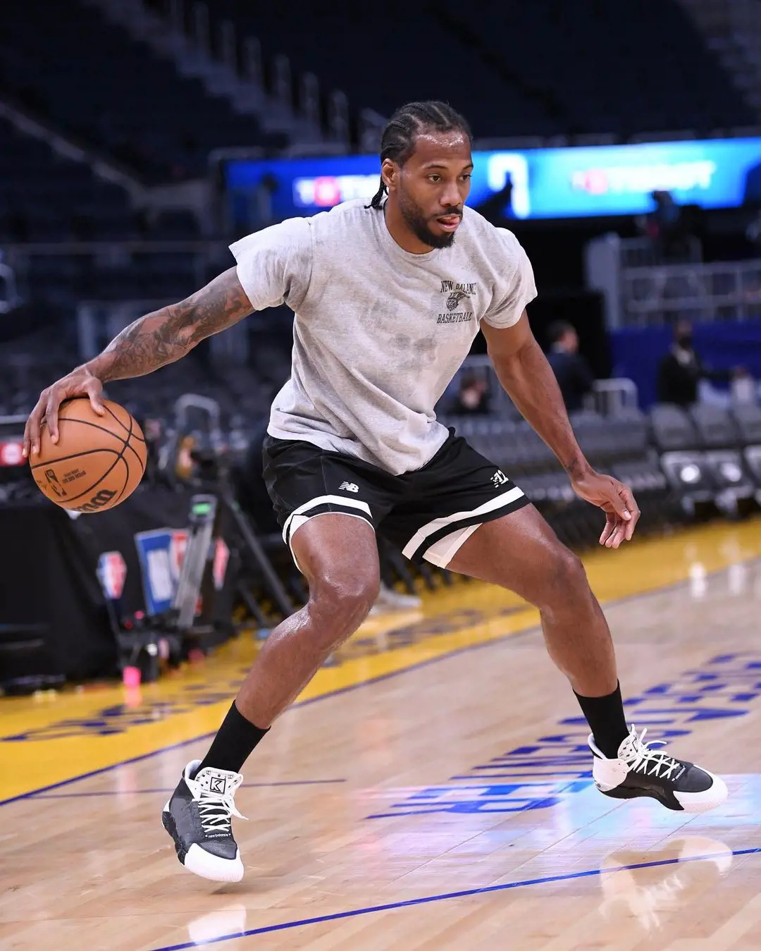 Kawhi Leonard working out for his program in a basketball court in 2022.