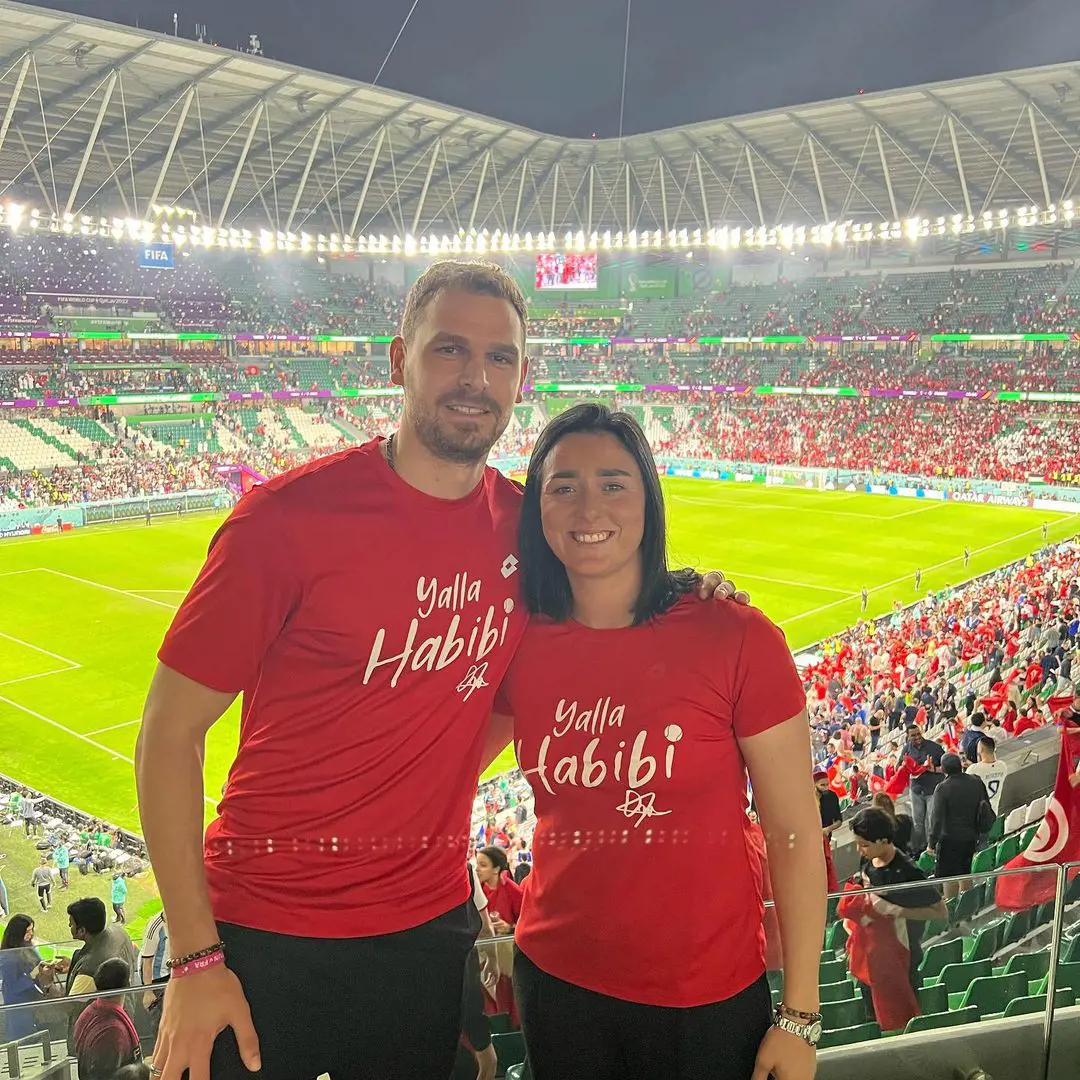 Ons and Karim pose together as they attend the FIFA World Cup for the Tunisia game on November 30, 2022