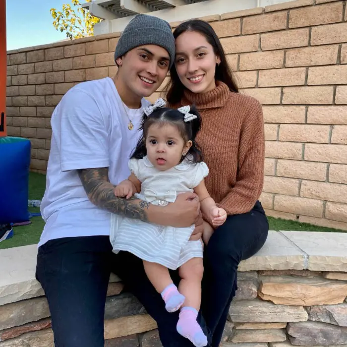 Sean poses for a family picture with his wife, Surrissa and daughter, Blue, on May 14, 2021