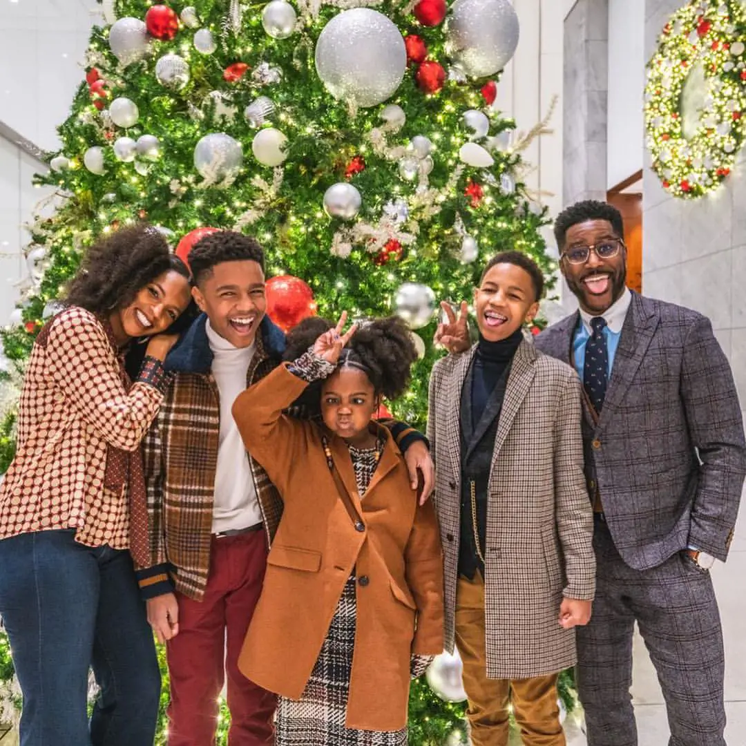 A 2018 picture of the Burlesons celebrating Christmas in New York in the '70s style theme.