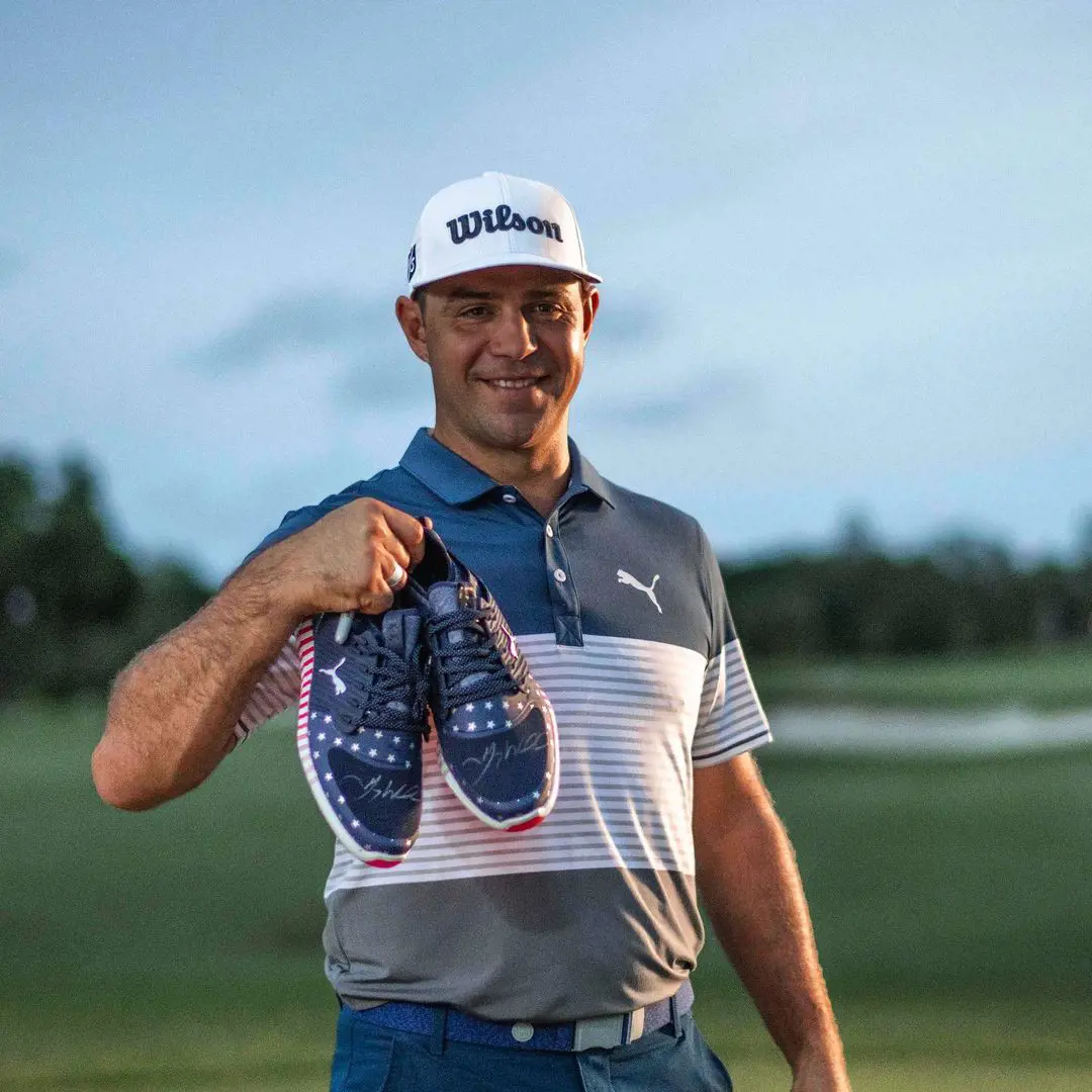 Gary Woodland promoting Puma's limited edition patriotic shoes in December 2019