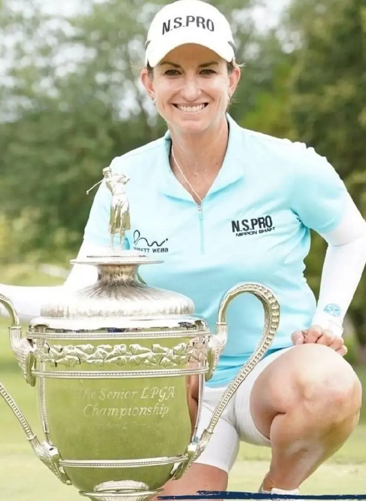 Karrie posing with 2022 Senior LPGA Championship trophy on July 25