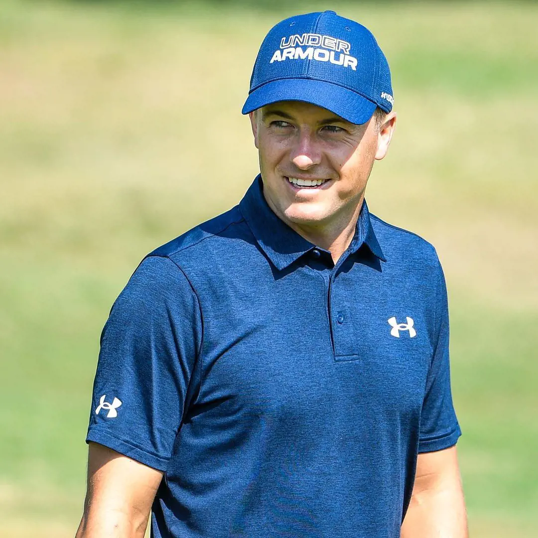Jordan ready for PGA tour playoff wearing Under Armor cap and T-shirt in 2021. 