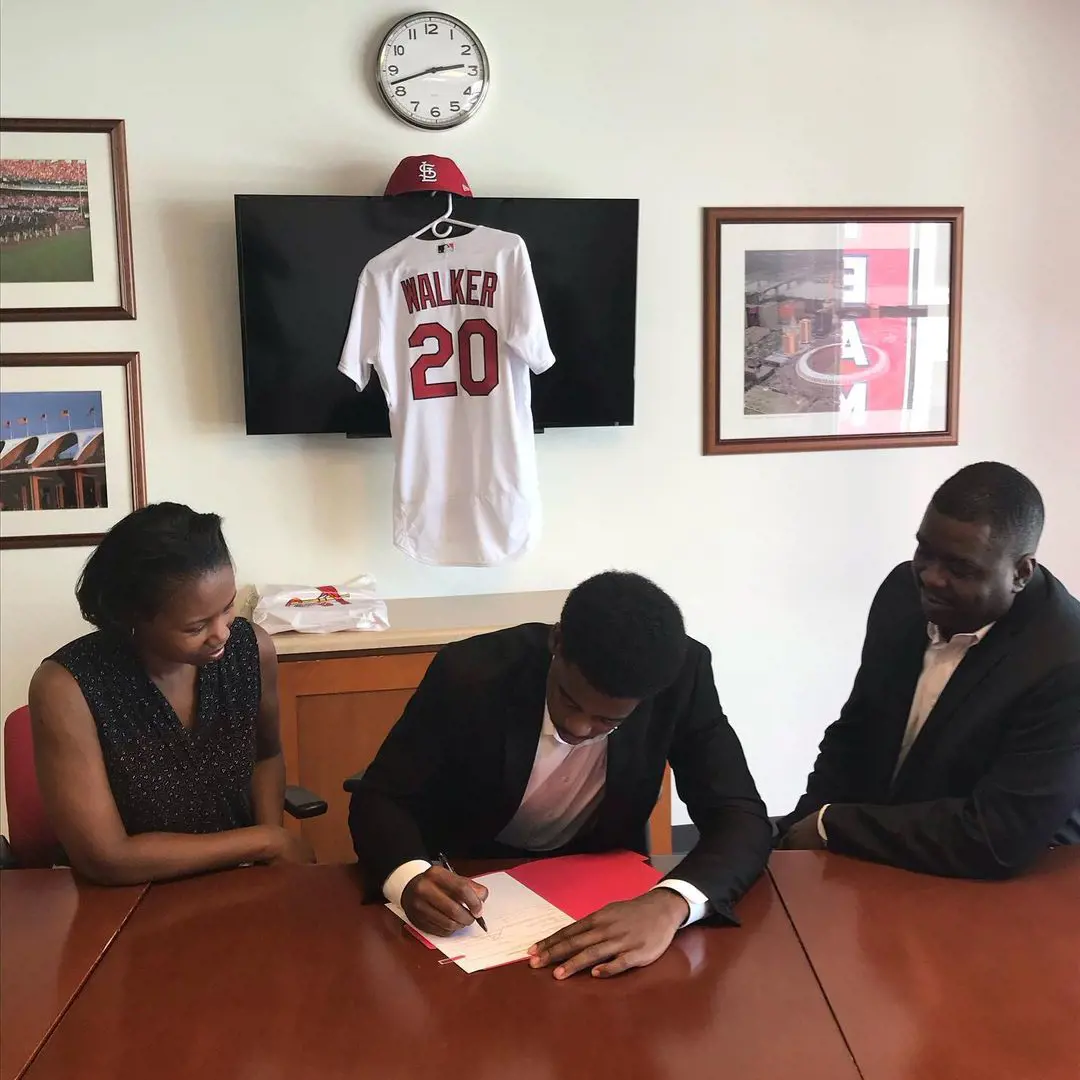 Jordan while signing an official contract with the Cardinals.