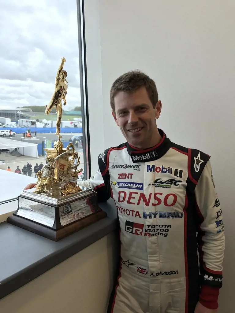 Anthony Davidson snapping a picture with the 117 year old RAC Tourist trophy in April 2017