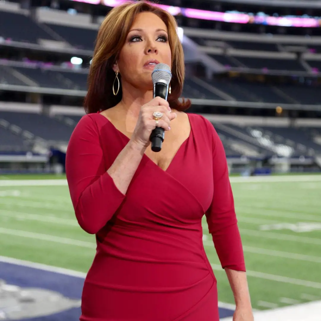 Finglass in her gorgeous red dress, talking in the mic while representing Dallas Cowboys Cheerleaders