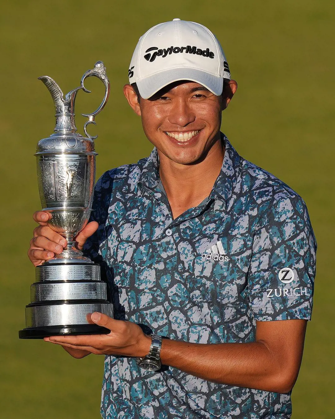 Collin holding Champion Golfer of the Year Trophy at Royal St George's Golf Club on July 19, 2021.