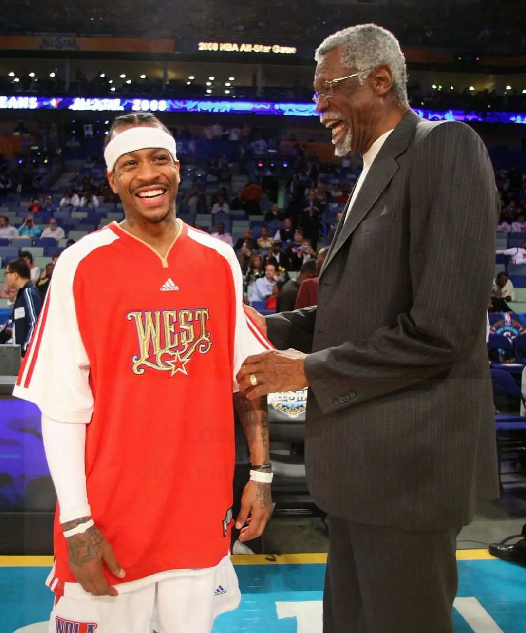 Iverson sharing a light moment with the legendary Bill Russel.