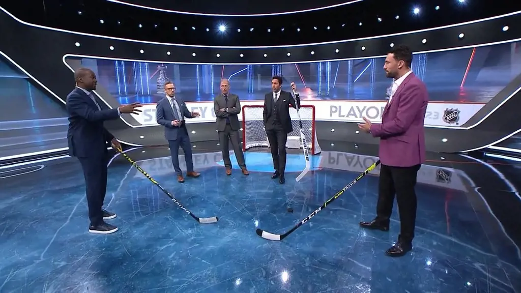 TNT studio announcers on discussion during Stanley Cup playoff game in April 2023