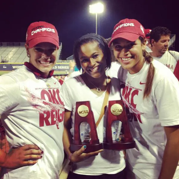  Holland Hall alumni Paris and Jules Townsend celebrating the title.