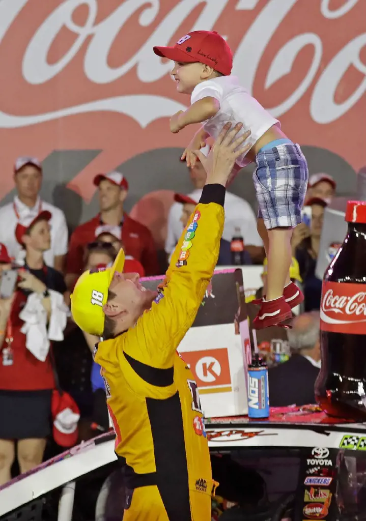 Busch lifts his son Brexton in glory after achieving the long-awaited victory.