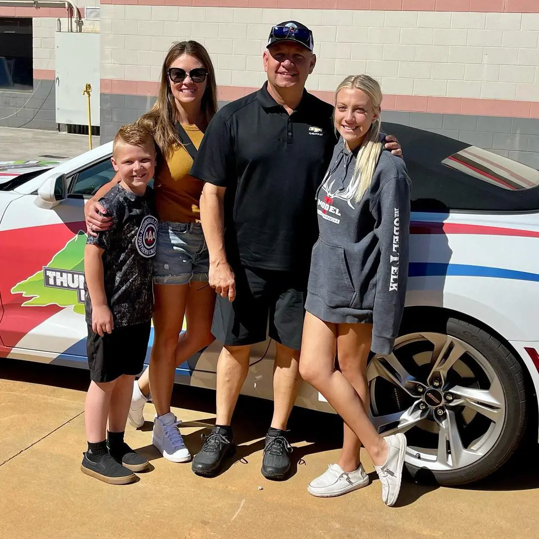 Left to right- Robert Jr, Leslie, Robert and Autumn looking happy together at Bristol Dragway on June 20, 2022. 