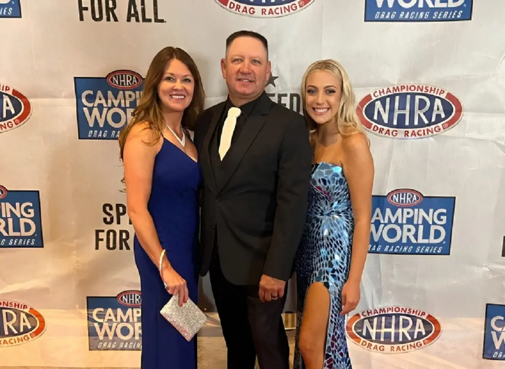 Leslie(left) with Robert and Autumn attending drag racing championship award on November 27, 2022. 