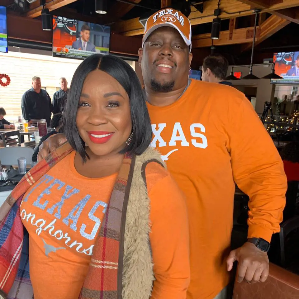 LaMore and Lamont supporting Texas Longhorn during a match in Feb. 2020
