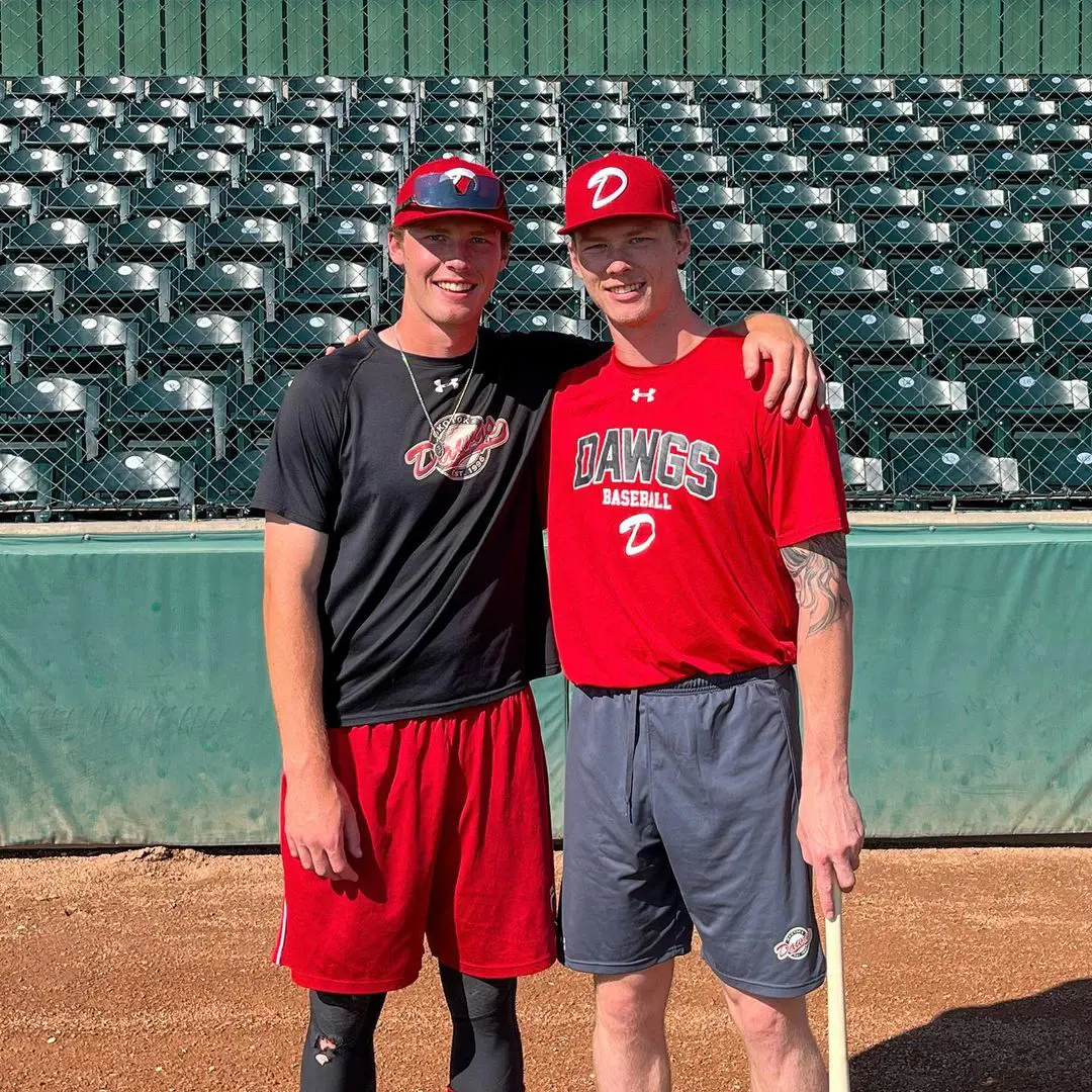 Noah(left) with Morgan at the Okotoks Dawgs baseball on July 2, 2022. 