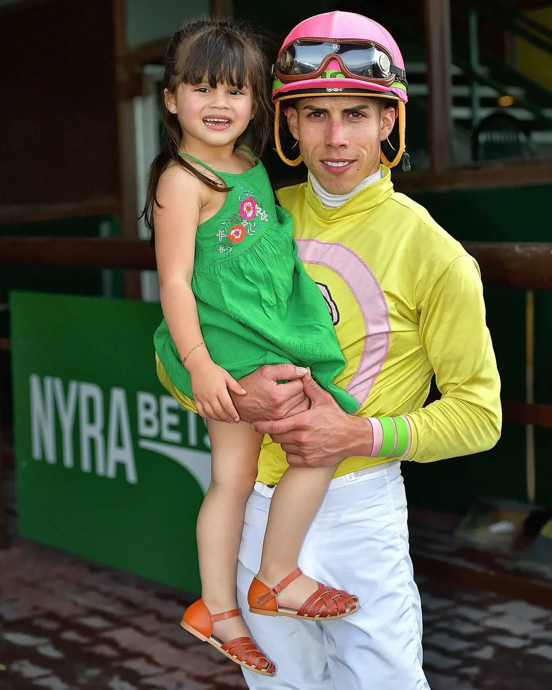 Sarai cheering up Irad during his race on June 30, 2018. 